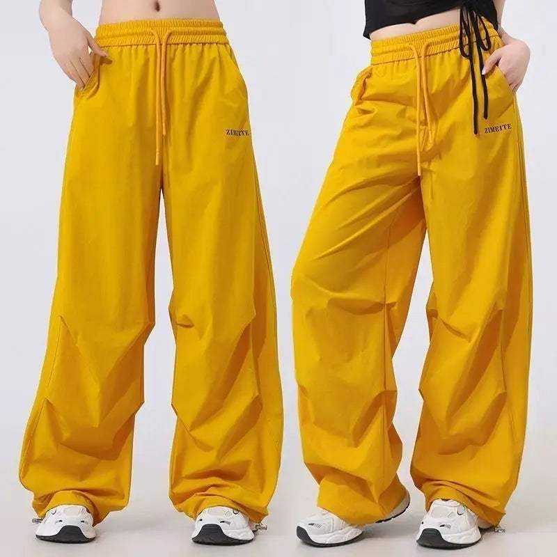 Fashion Printed Letter Spliced Pockets Casual Pants Female Clothing 2025 Spring Summer New Loose Elastic High Waist Cargo Pants