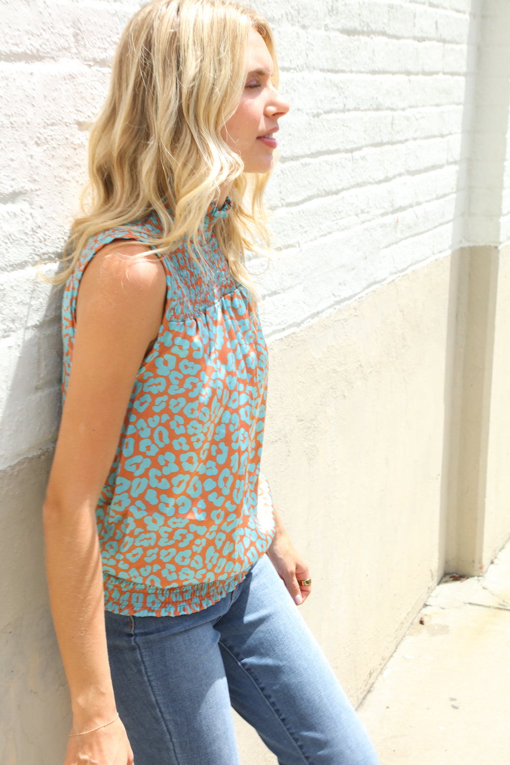 Dazzle In Teal Smocked High Neck Animal Print Sleeveless Top