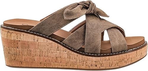 Brown wedge sandal with cork sole on a white background