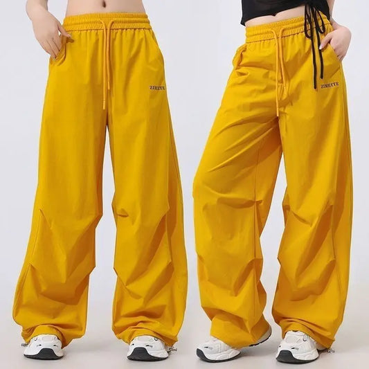 Fashion Printed Letter Spliced Pockets Casual Pants Female Clothing 2025 Spring Summer New Loose Elastic High Waist Cargo Pants