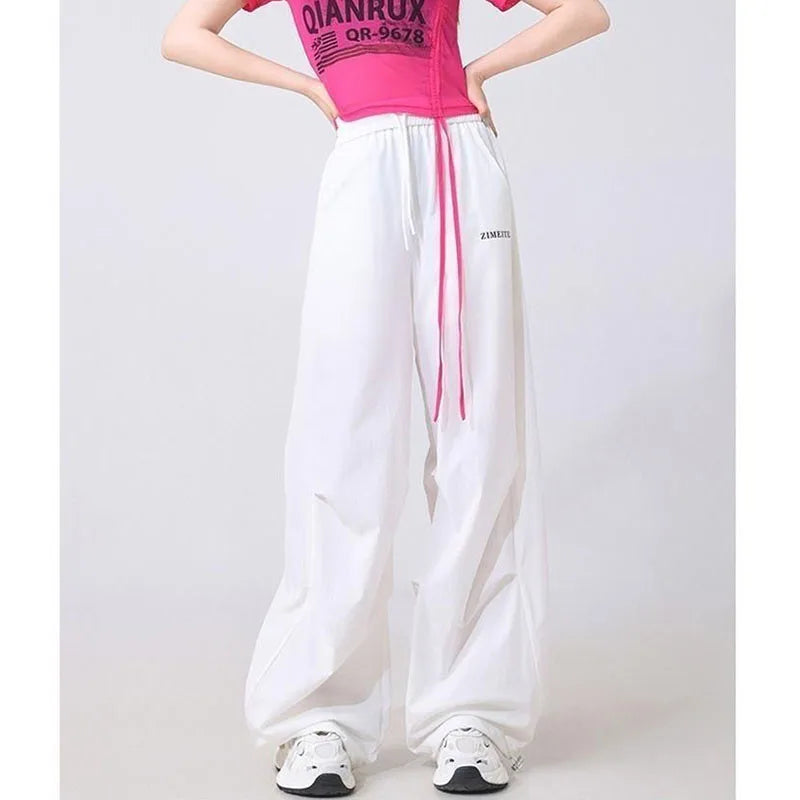 Fashion Printed Letter Spliced Pockets Casual Pants Female Clothing 2025 Spring Summer New Loose Elastic High Waist Cargo Pants